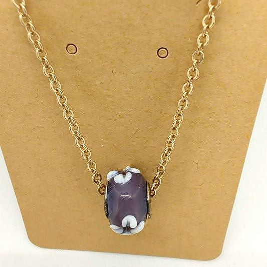 Collar floral morado