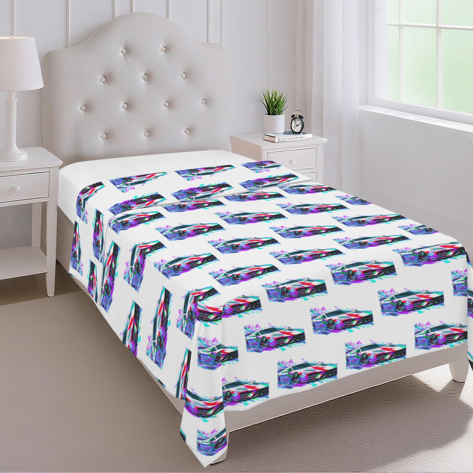 Bed with colorful abstract patterned bedspread in a bedroom setting.