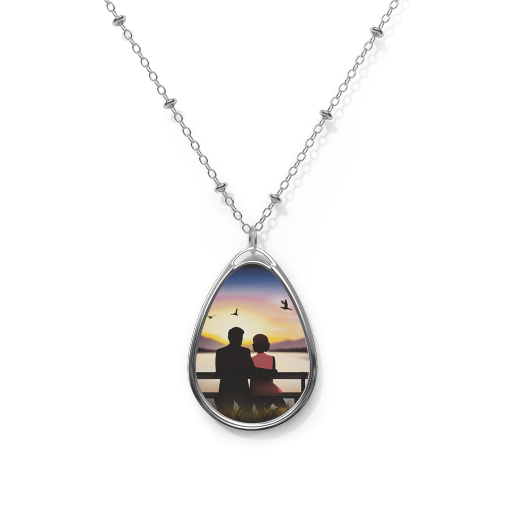 Couple Sitting on a Bench at Sunset Oval Necklace