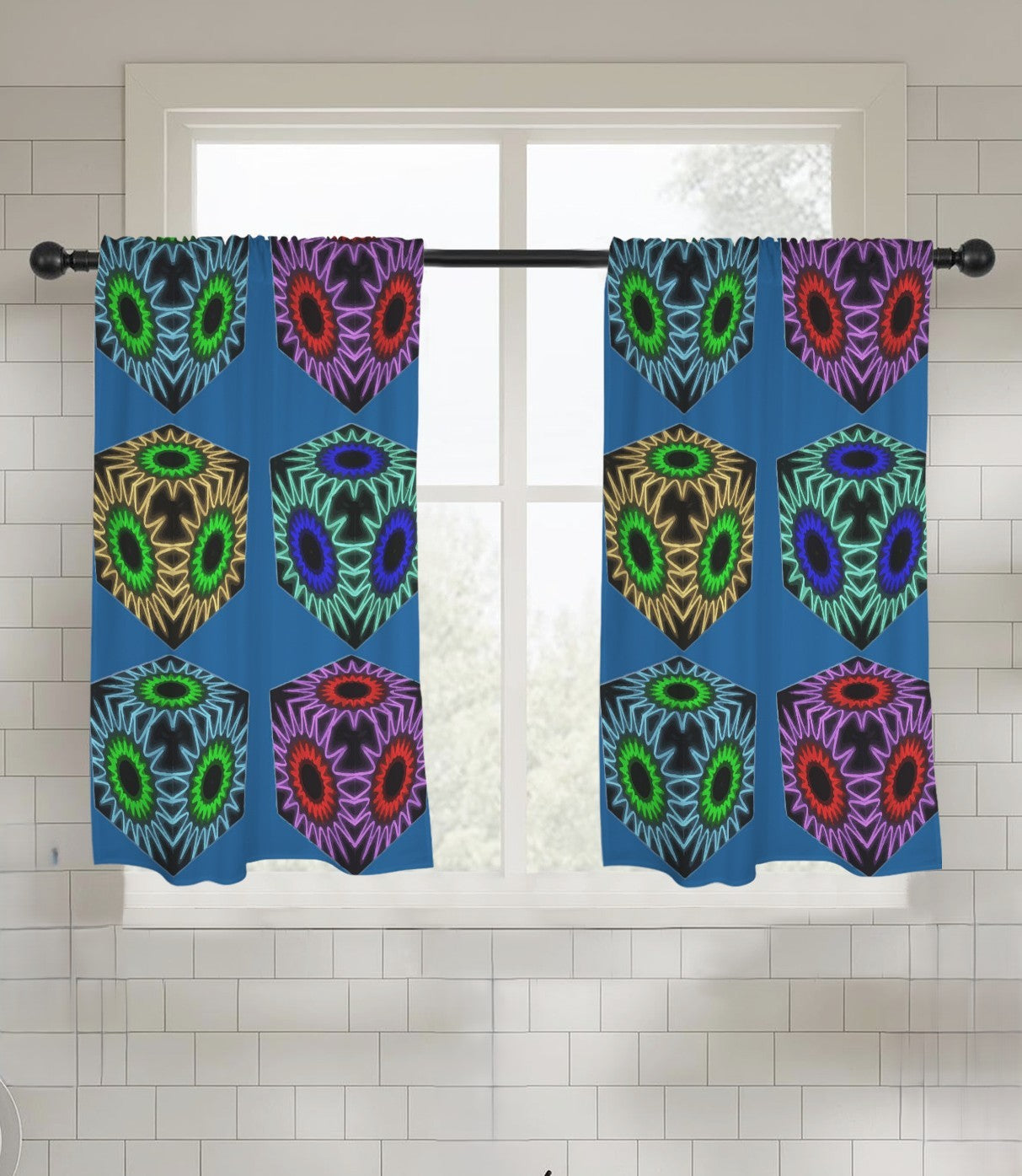 Colorful patterned curtains hanging on a rod with a tiled wall background