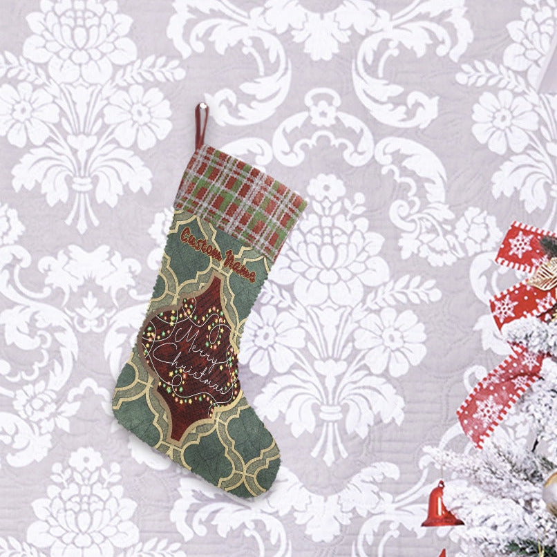 Christmas decorations including a wreath, stockings, Santa figure, and tree against a patterned wall.