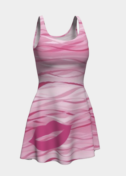 Pink and white patterned dress on a light gray background