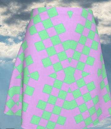 Pink and green checkered wrap skirt with 'Shell' brand logo against a cloudy sky background.