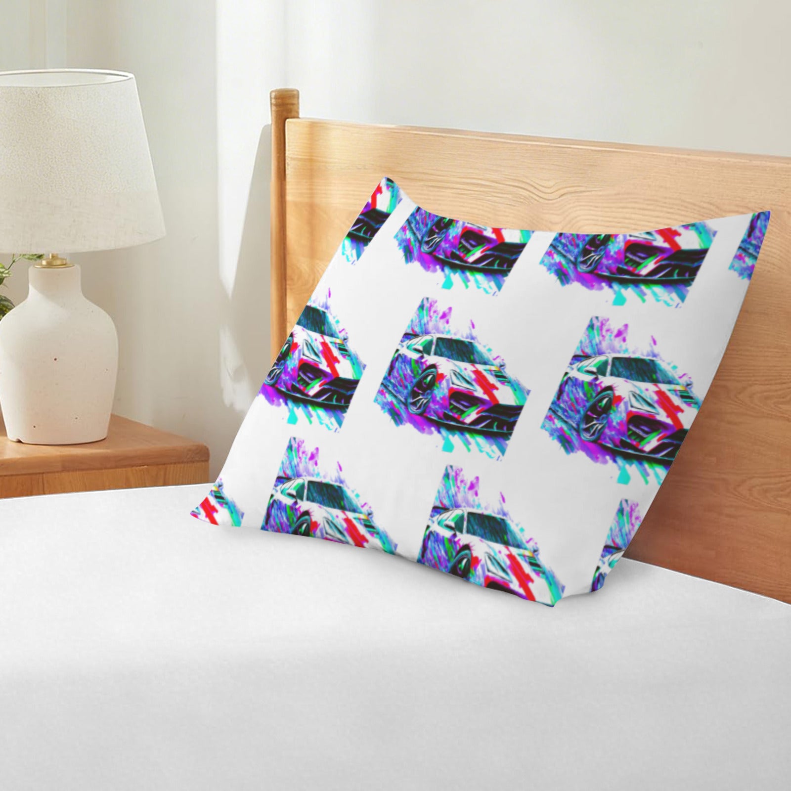 Decorative pillow with colorful geometric pattern on a bed