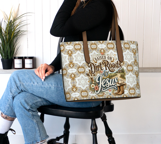 Raised on Dirt Roads & Jesus Vegan Leather Tote Bag