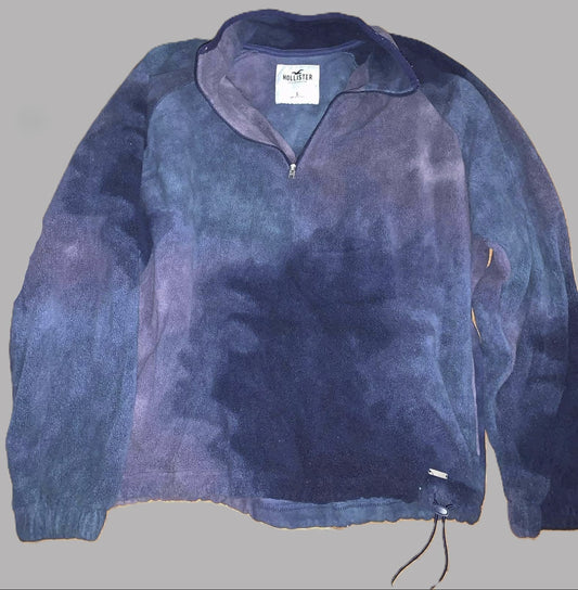 Blue tie-dye pullover with 'Women's small' text on a gray background