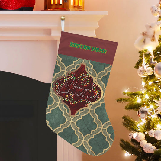 Decorative Christmas stocking with 'Custom Name' text, hanging by a fireplace next to a lit Christmas tree.