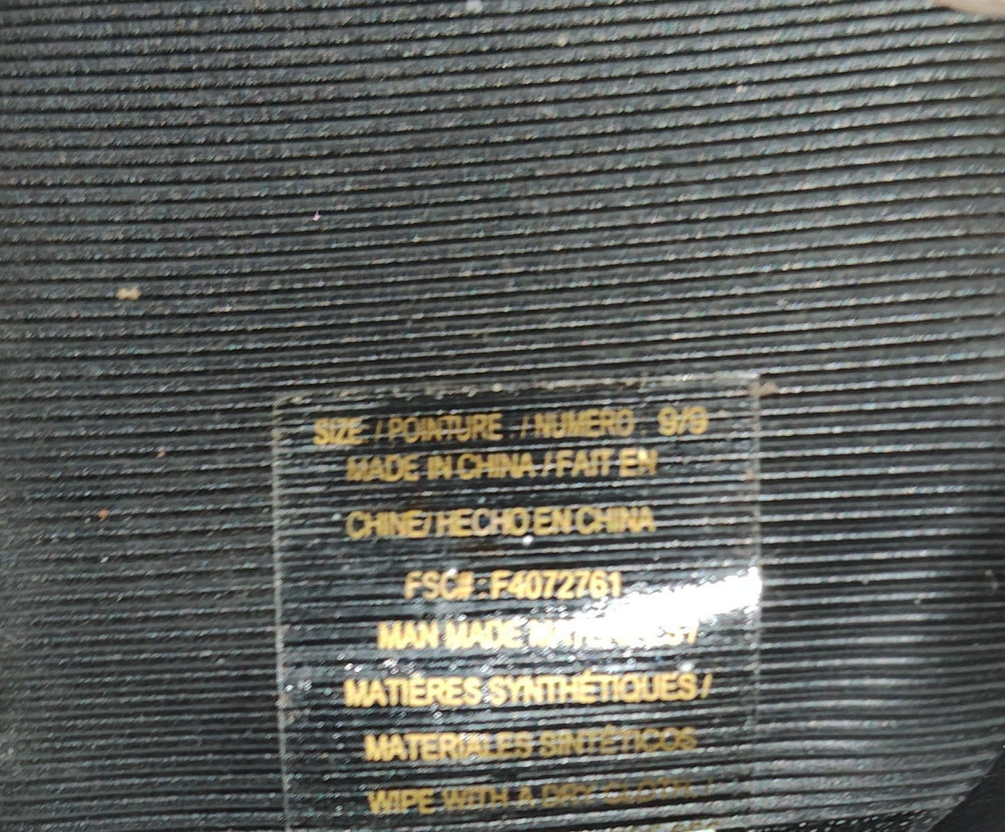 Botas negras con cordones y tacones de aguja