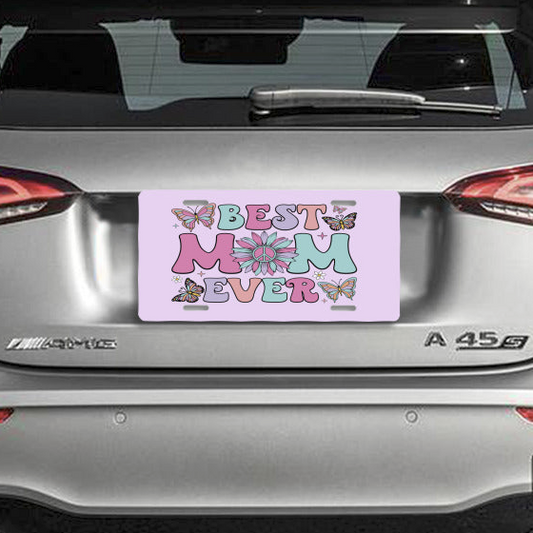 Pink car license plate with 'Best Mom Ever' text on back of a car.