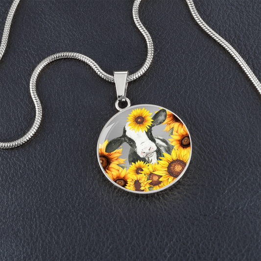 Cute Little Cow Surrounded by Sunflowers Circle Graphic Necklace