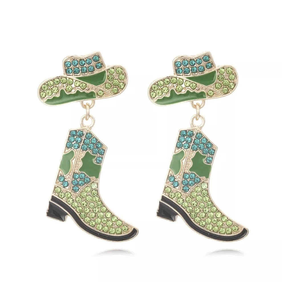 Green cowboy boot and hat earrings on a white background