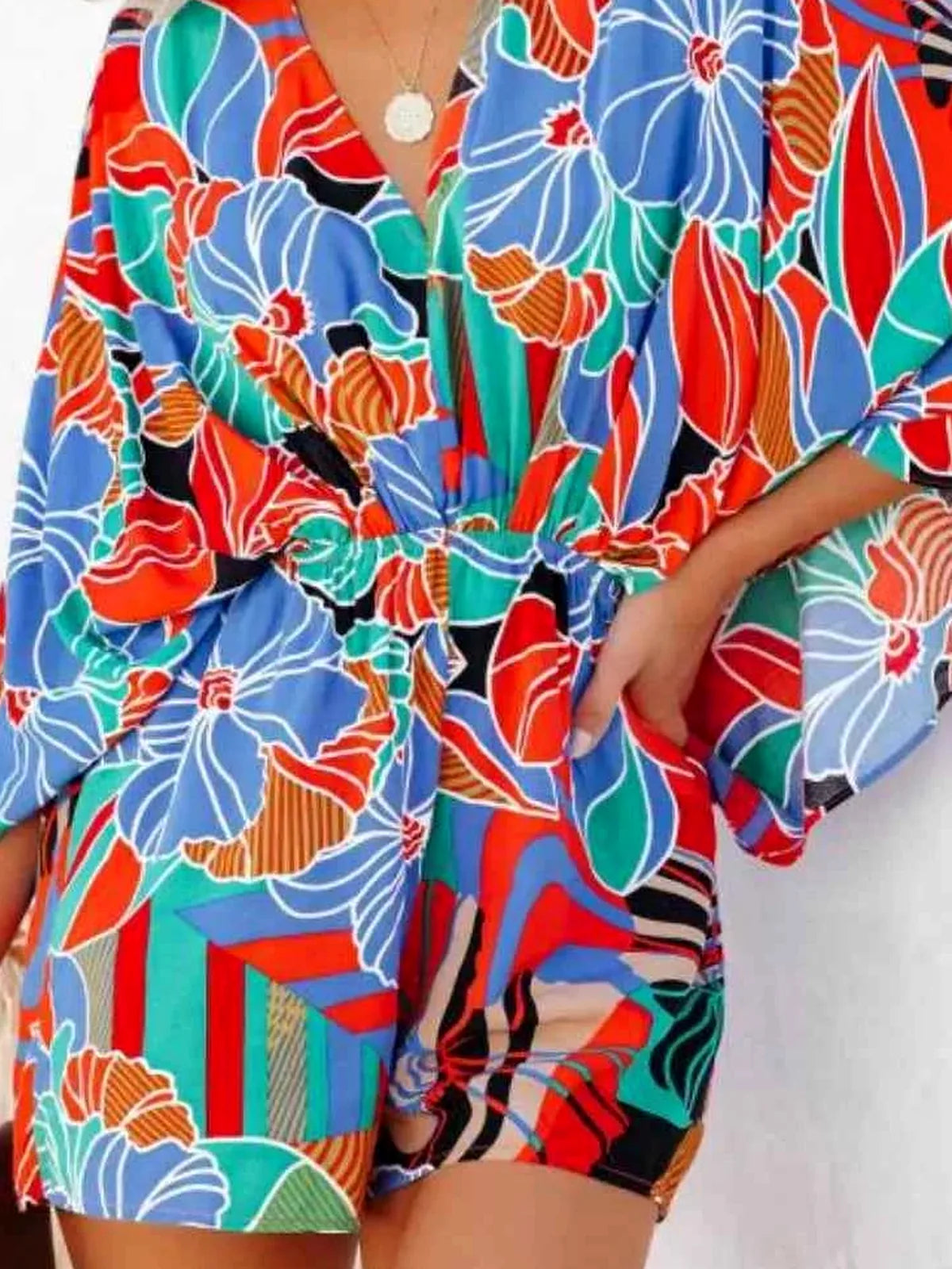Colorful floral-patterned outfit with a white background