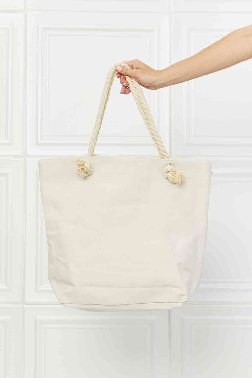 Bolso tote con borlas y fecha de picnic de Justin Taylor